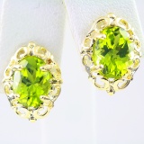 Pair of estate 14K yellow gold peridot stud earrings