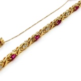 Vintage 14K yellow gold diamond & natural ruby tennis bracelet