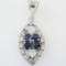 Vintage unmarked 18K white gold diamond & natural sapphire eye-shaped pendant