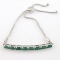 Estate sterling silver natural emerald curved bar bracelet