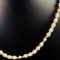 Vintage genuine ivory & 14K yellow gold beaded necklace