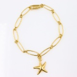 Authentic Estate Tiffany & Co. by Elsa Peretti 18K yellow gold star fish charm oval link bracelet