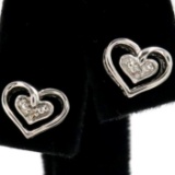 Pair of estate sterling silver diamond heart earrings