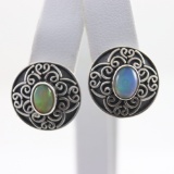 Pair of estate sterling silver opal stud earrings