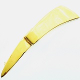 Estate Givenchy yellow gold-plated ribbon pin