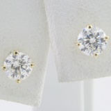 Pair of estate 14K yellow gold diamond stud earrings