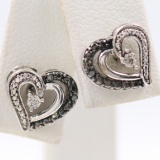 Pair of estate sterling silver black & white diamond heart stud earrings