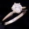 Estate unmarked 14K white gold diamond solitaire ring