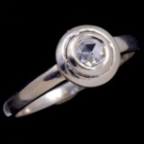 Vintage .950 platinum diamond bezel solitaire ring