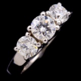 Estate 14K white gold three-stone diamond ring