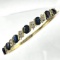 Estate 18K yellow gold diamond & natural sapphire hinged bangle bracelet