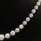 Estate white pearl graduated necklace with 10K white gold findings