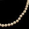 Vintage lustrous cultured pearl necklace with a 14K yellow gold clasp