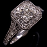 Estate unmarked 14K white gold diamond cluster halo ring