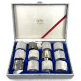 New-in-the-box set of 12 silver-plated napkin rings in a hinged case