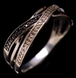 Estate sterling silver black & white diamond cross-over ring