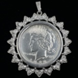 1922 U.S. peace silver dollar in a white metal bezel