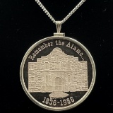1985 Alamo 150th anniversary 1oz silver round in a sterling silver bezel with a white metal chain