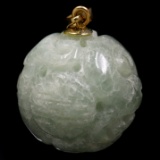 Vintage hand-carved genuine jade pendant with a 14K yellow gold bale