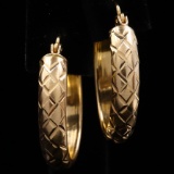 Pair of estate 10K yellow gold diamond-cut hoop earrings