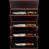 Lot of 8 new-in-the-box Falkner commemorative hunting knives