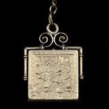 Antique yellow gold-filled watch chain with locket fob