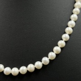 Estate cultured white pearl necklace with 14K yellow gold clasp