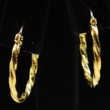 Pair of estate 14K yellow gold twist hoop earrings