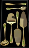 Like-new 5-piece service for 12 Christmas holly-pattern gold-tone stainless steel flatware set