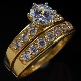 Never-worn estate 14K yellow gold CZ wedding ring set