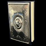 Like-new sterling silver-covered address book