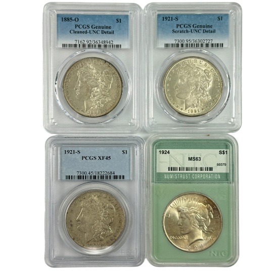 Lot of 4 certified U.S. Morgan silver dollars