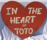 In the Heart of Toto Sign