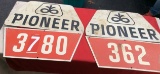 2 Pioneer Seed Hardboard Signs