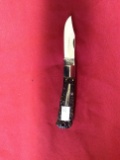 Bowen model R 1306B, single bladed lock back with Delrin handles with bulle