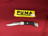 1970s Made in Germany Puma MINT in yellow box model 260, black handle singl