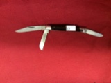 1970s Bowen model 115, 3 bladed small stockman.  Blade etching runs over th