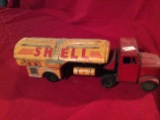 H & S Shell  made in Japan Tin Friction Toy