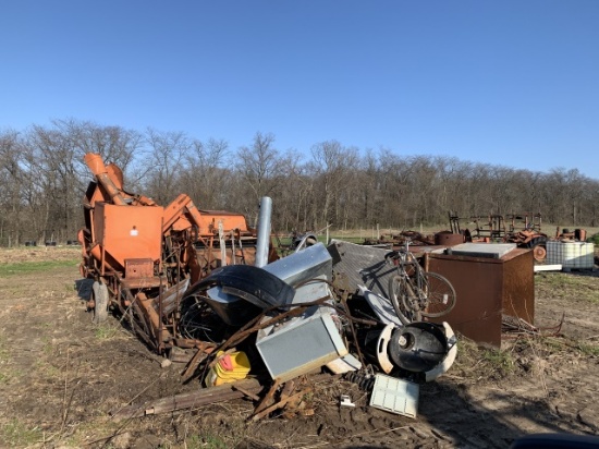 Large scrap pile including AC pull type combine