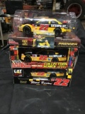 Three racing champion caterpillar cars 1/24 scale