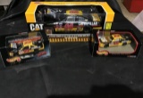 Two hot wheels cat cars and one racing champions cat car 1/18 scale