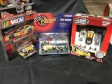 Two racing champions and one winner circle cat cars 1/64 scale