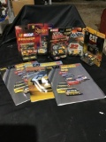 Inside cat racing 2003 and 2002 editions and five matchbox cars