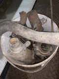 Bucket of parts including carburetors