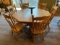 Claw Foot Table 60”x29”  w/ lazy susan 12.5”x10” and (8) Chairs 16”