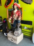 Captain Morgan statue with foot on barrel on pedestal, plastic , 28”x38”x84”