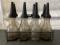 Eight - Vintage Quart Glas Oil Jars with Spouts and Metal Carrier 17.75x4x9