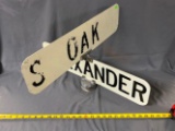 Cross street sign, painted letters