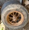 Two Steel-Spoke Wheels with Tires Marked ‘Front Tractor’