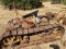 Rusty Steel Tracked Tractor Base with Assorted Parts